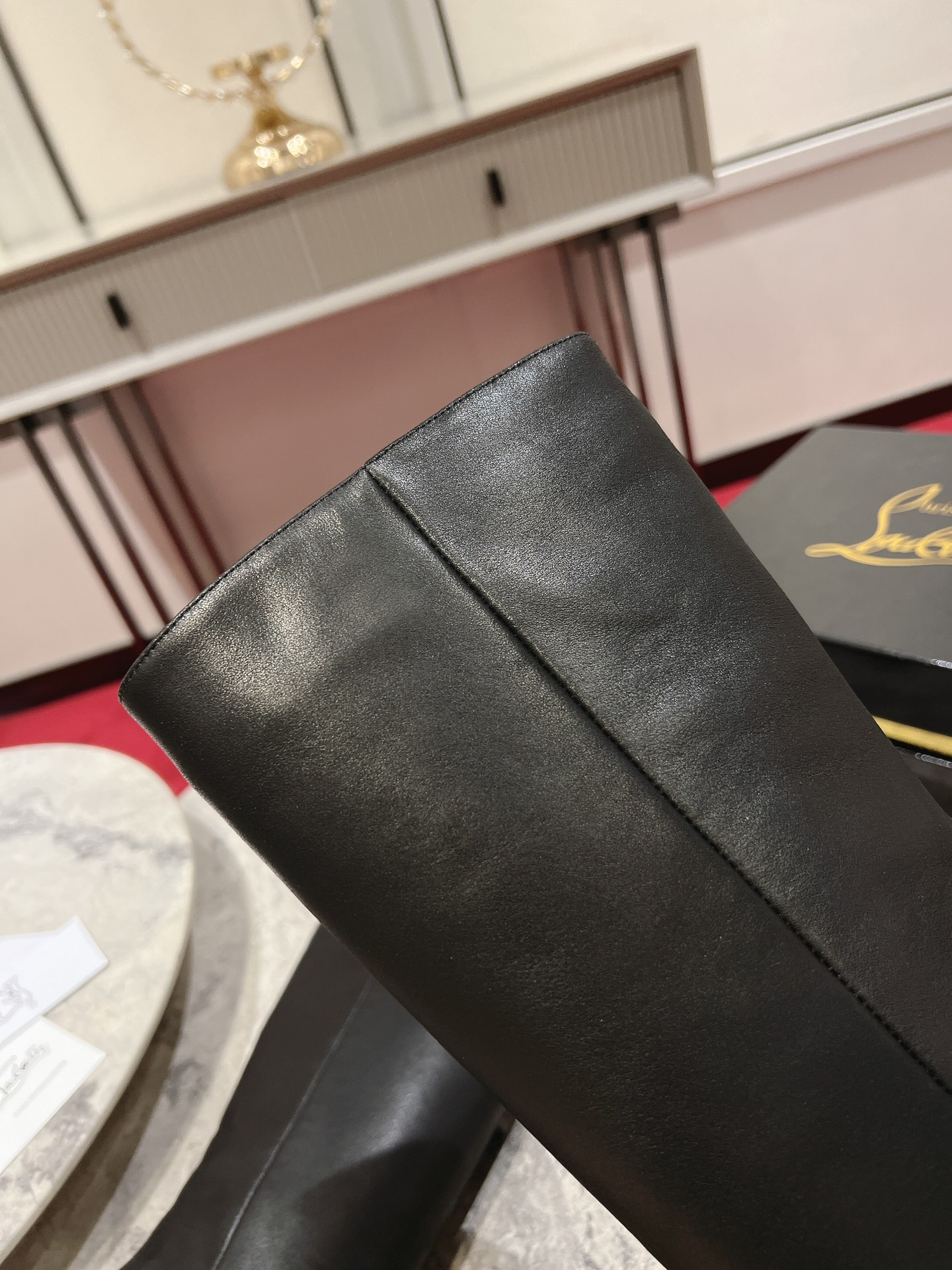 Christian Louboutin red-soled long bootsThe Astrilarge Booty mid-calf boots