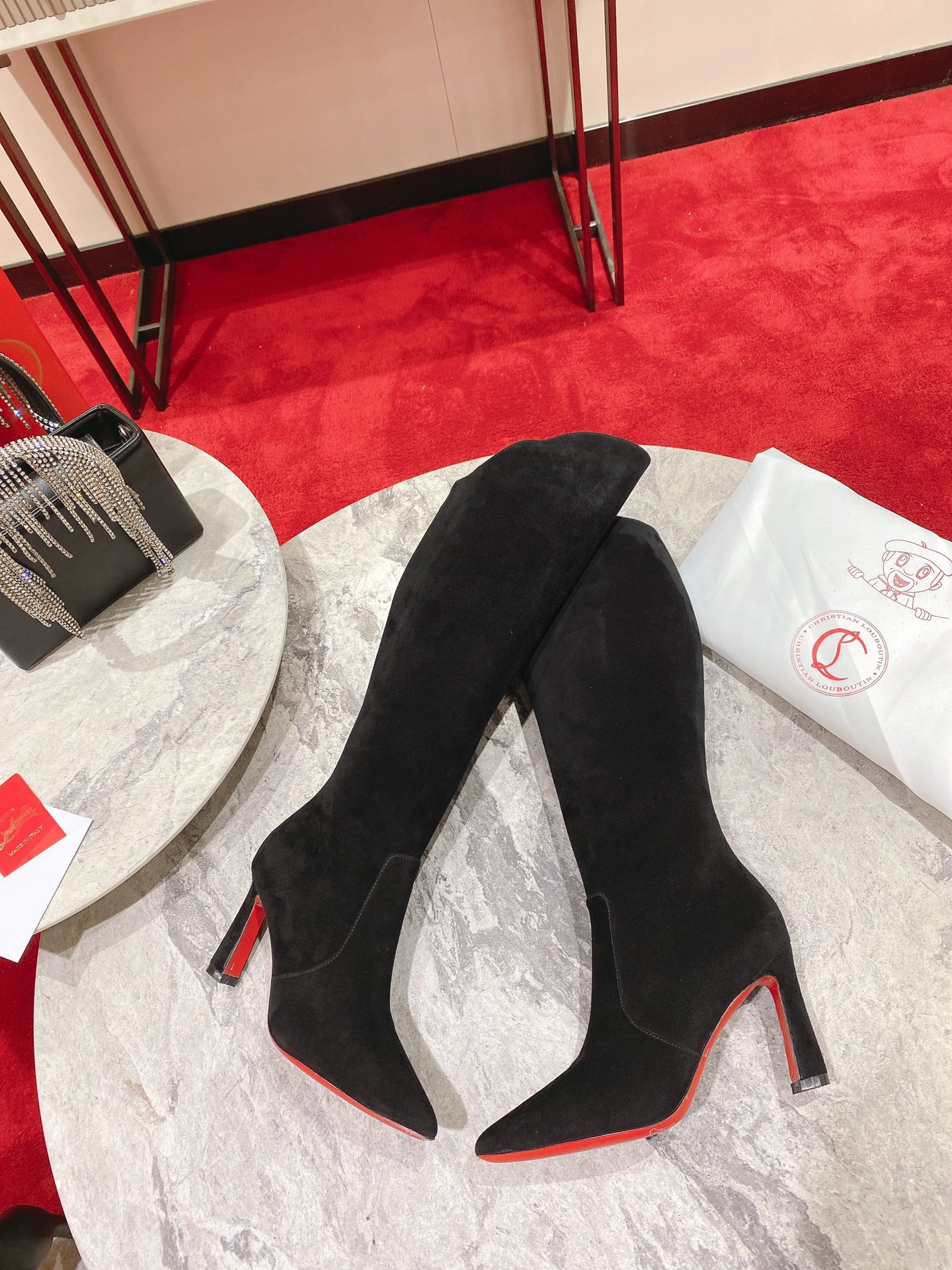 Christian Louboutin red-soled shoes The classic long boots