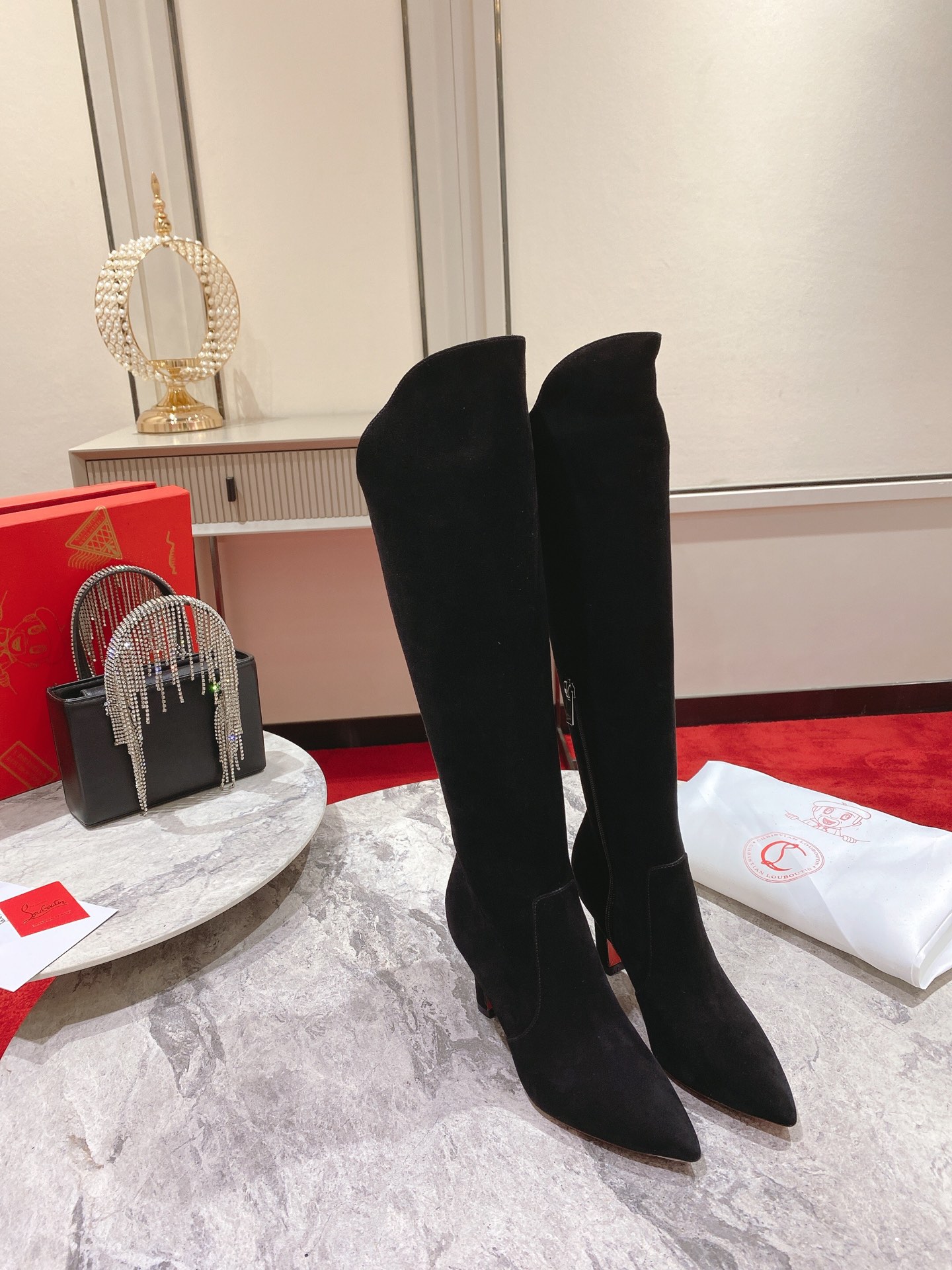 Christian Louboutin red-soled shoes The classic long boots