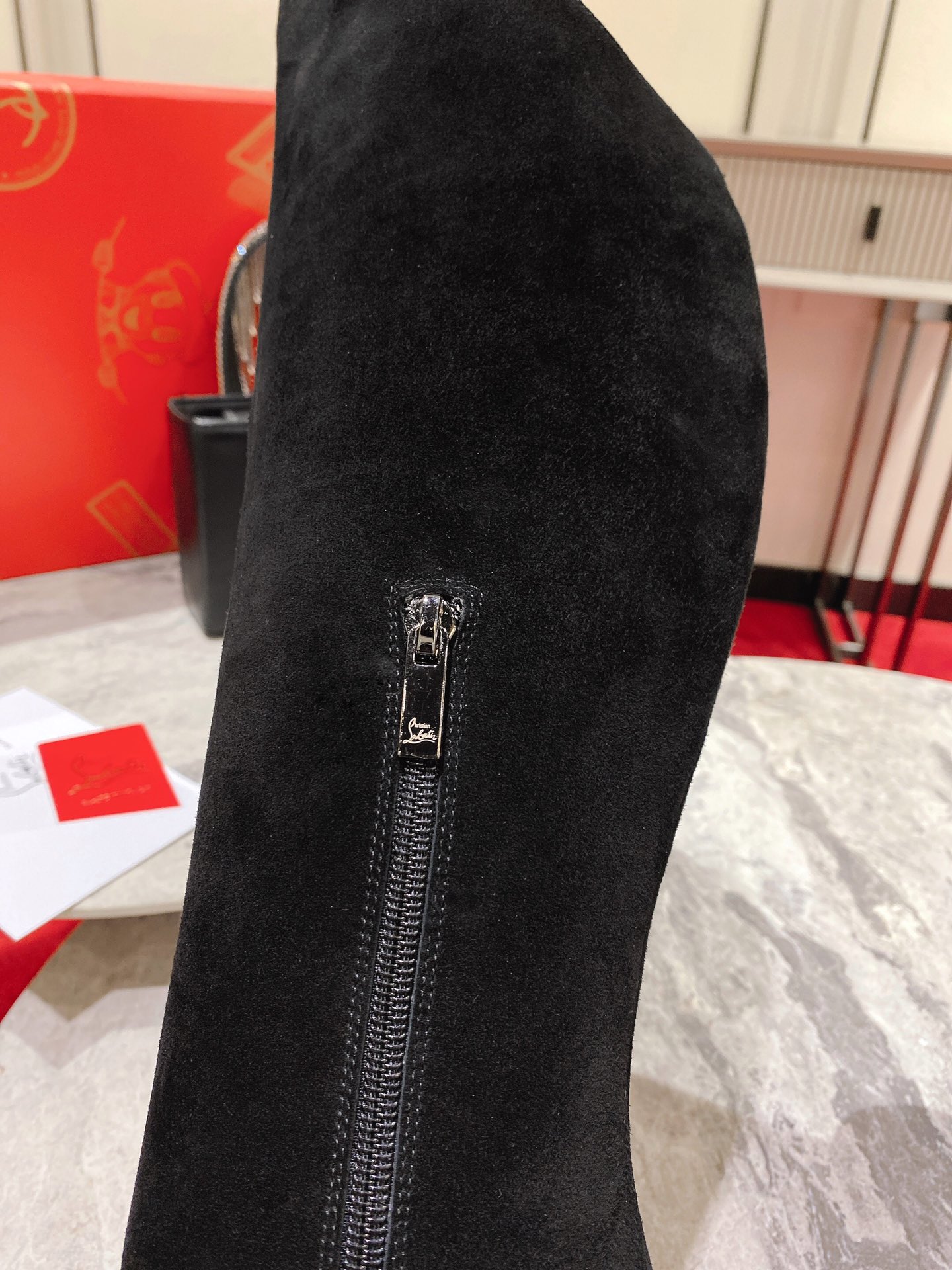 Christian Louboutin red-soled shoes The classic long boots