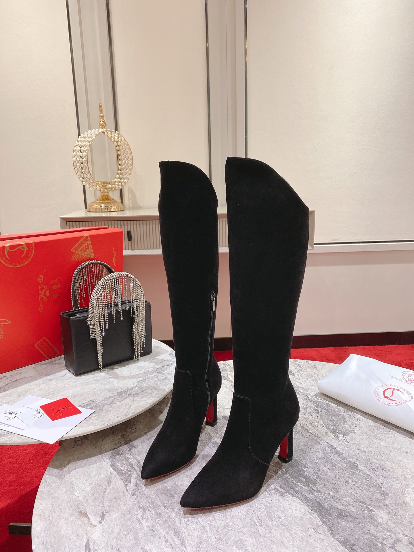 Christian Louboutin red-soled shoes The classic long boots