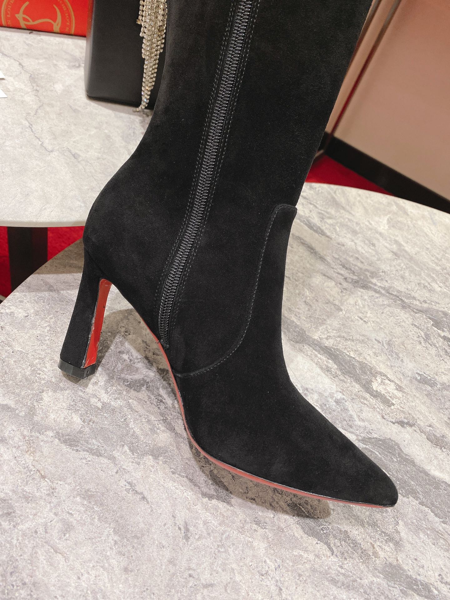 Christian Louboutin red-soled shoes The classic long boots