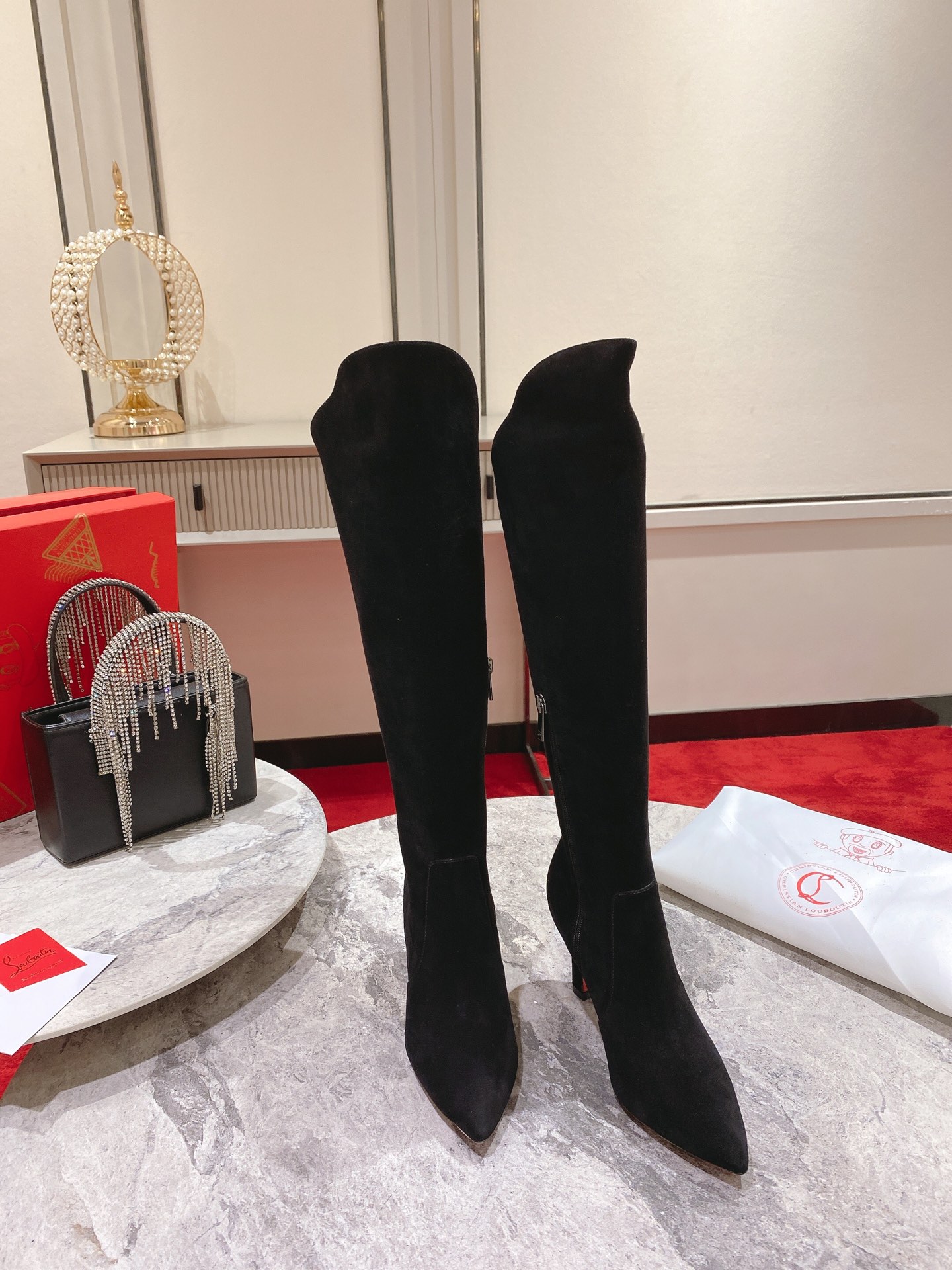 Christian Louboutin red-soled shoes The classic long boots
