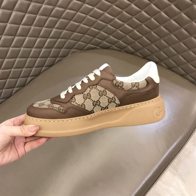 GUCCI MEN S GG EMBOSSED SNEAKER   GCC033