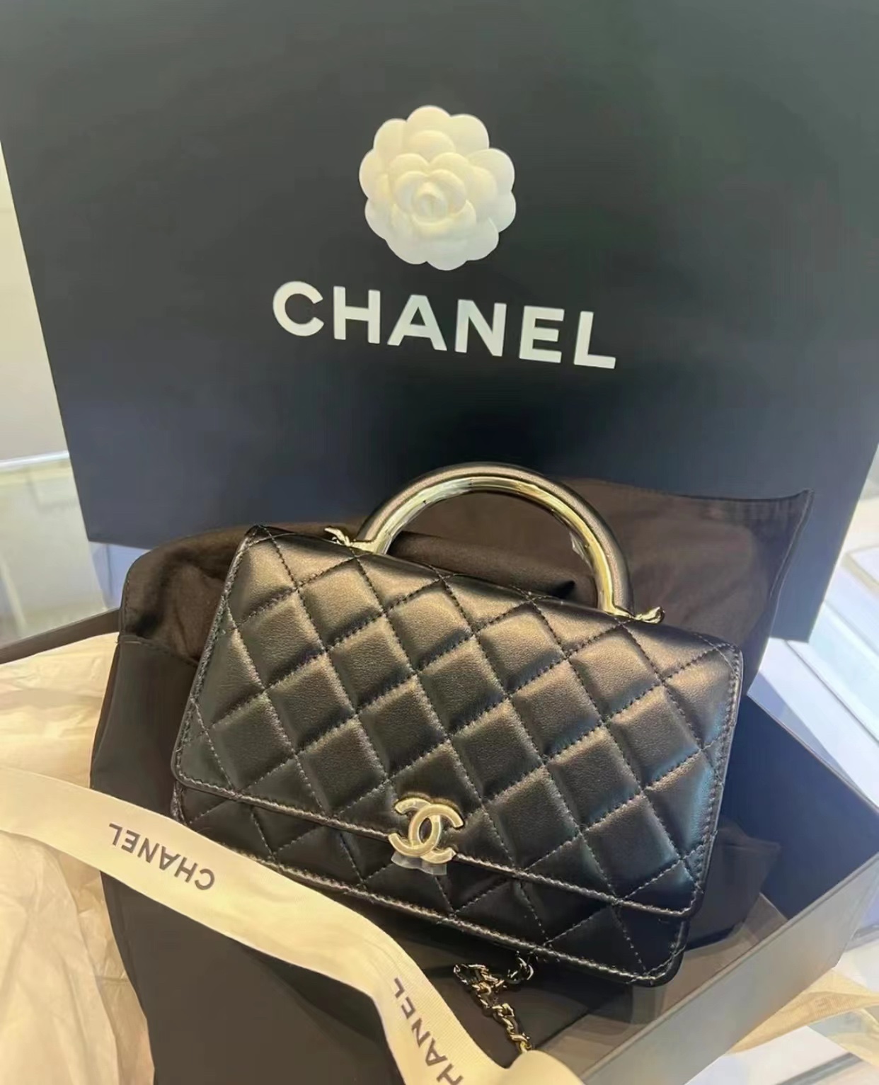 CHANEL Quilted Lambskin Leather Clutch