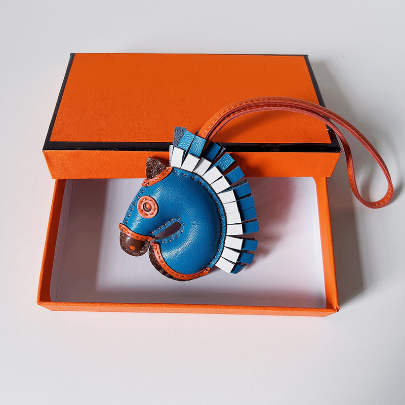 Handsewn unicorn pendant