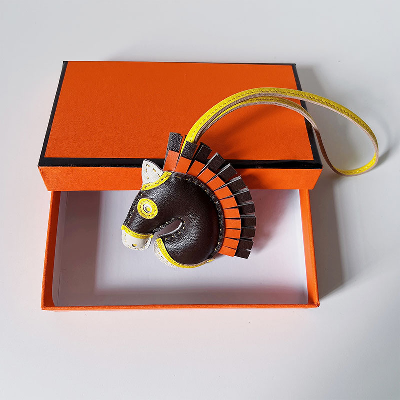 Handsewn unicorn pendant