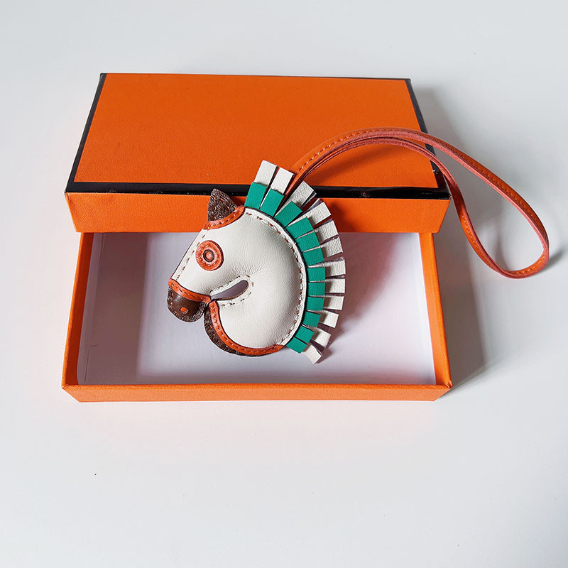 Handsewn unicorn pendant