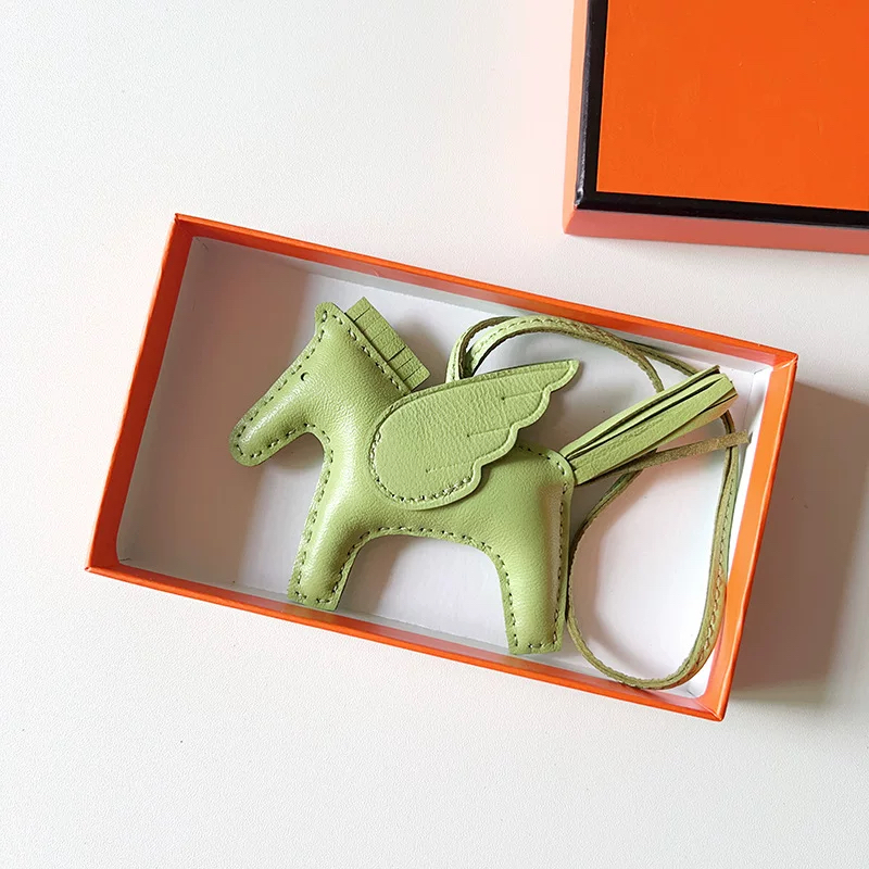 H Hand sewn pony pendant