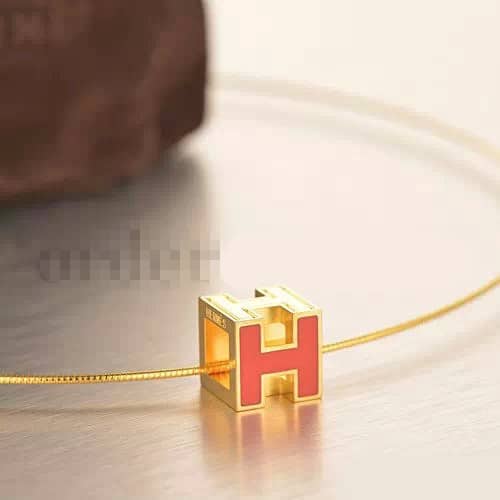 Hermes Cage d’H Necklace Orange in Lacquer Yellow Gold