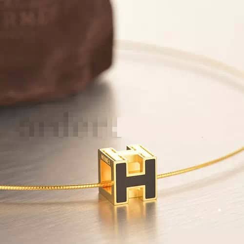 Hermes Cage d’H Necklace Black in Lacquer Yellow Gold