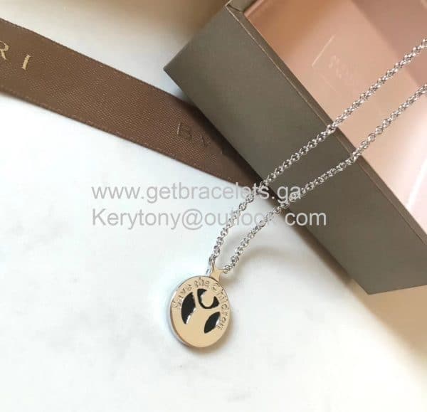 Save the Children 10th Anniversary Necklace in Sterling Silver with Onyx Insert and a Ruby Best Price