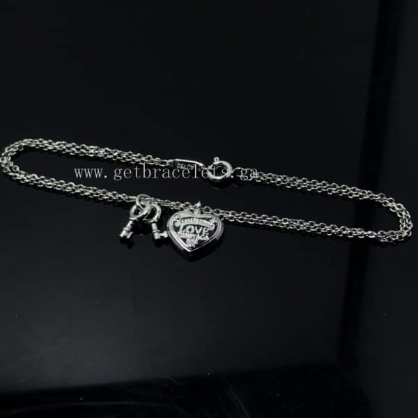 Return to Tiffany Love Heart Tag Key Bracelet in Silver/Rose Gold