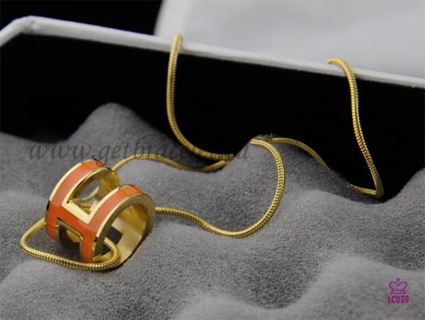 Hermes 3D Pop “H” logo Snake Bone Orange Necklace in Yellow Gold