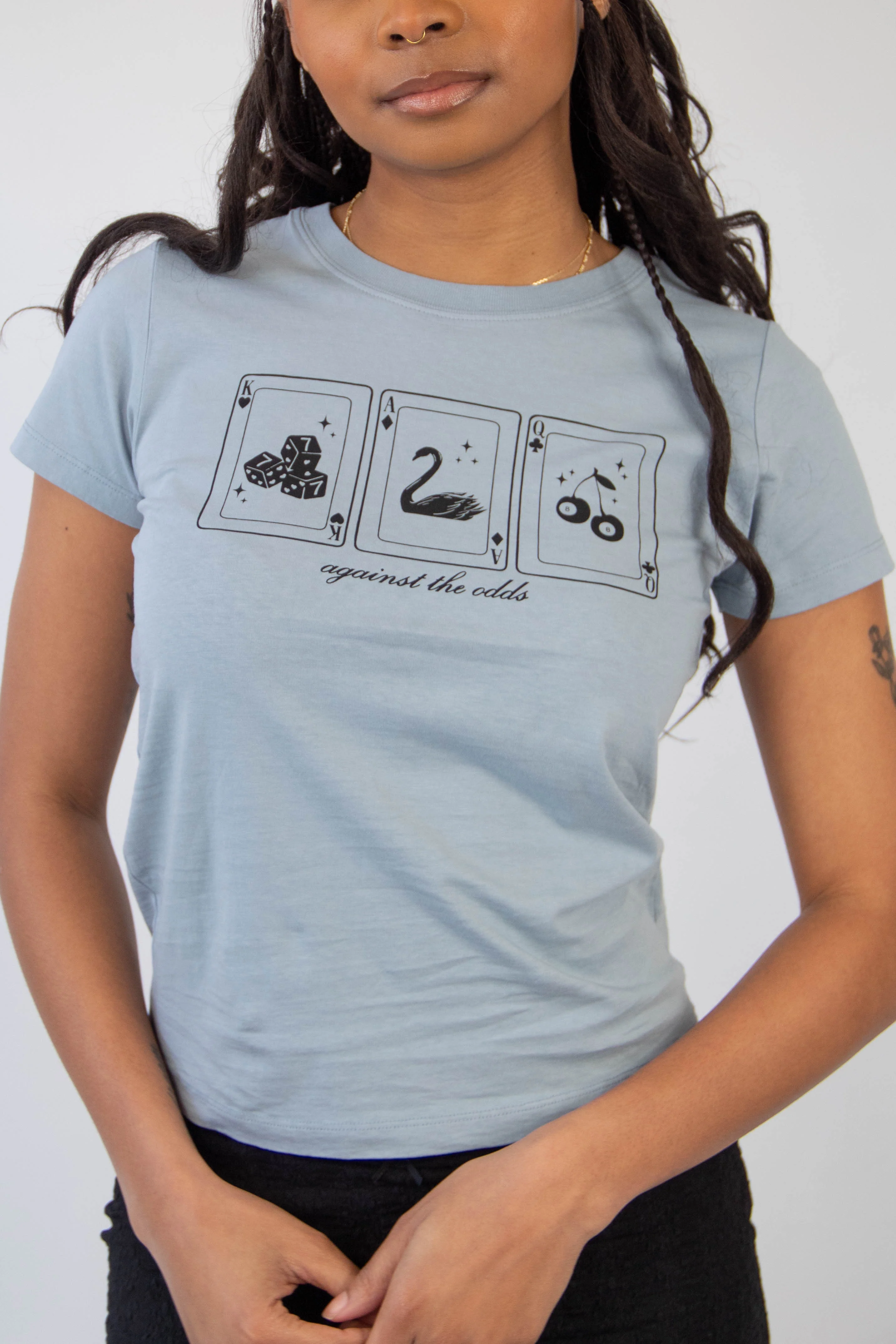 Against The Odds Long Loose Graphic Baby Tee