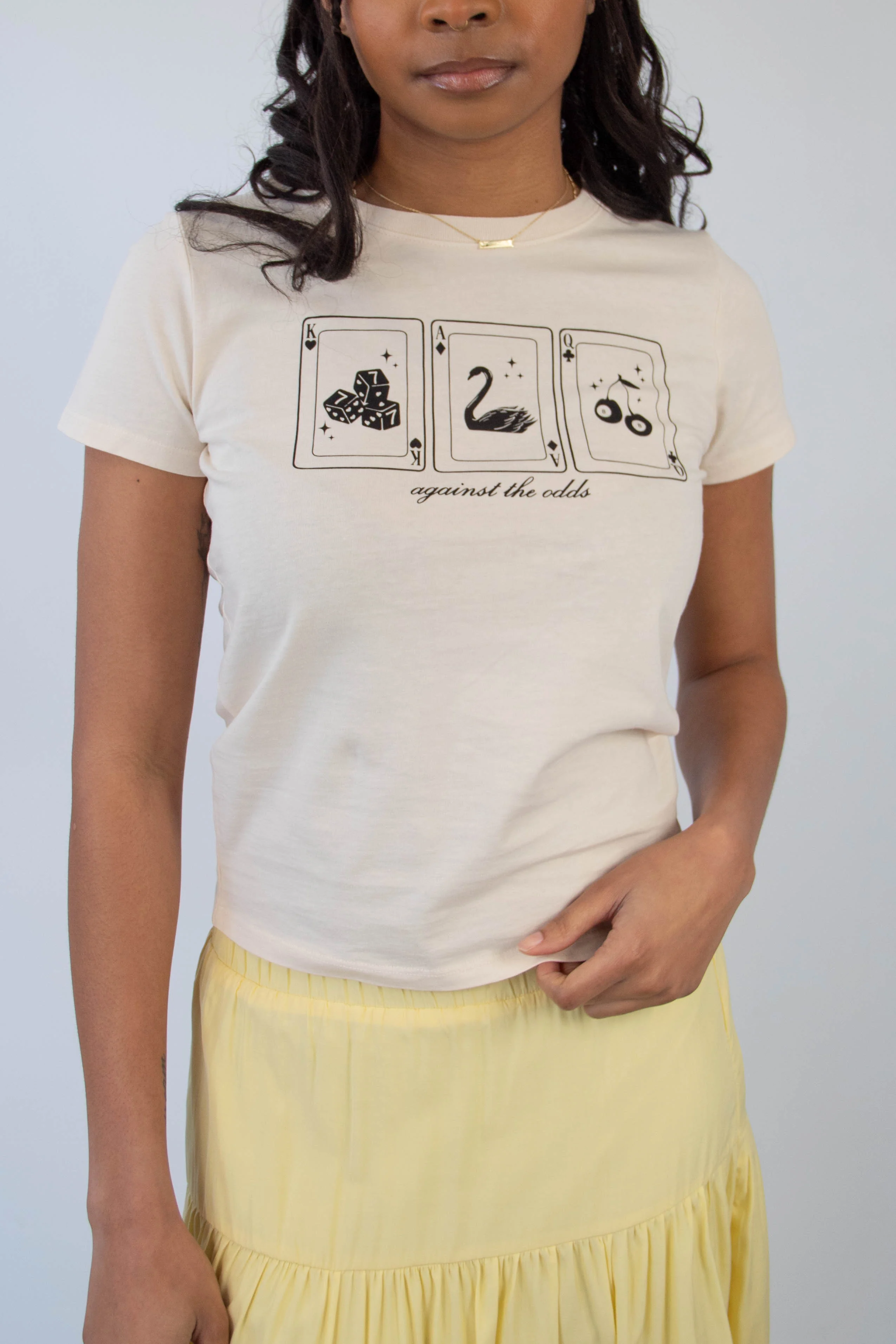 Against The Odds Long Loose Graphic Baby Tee