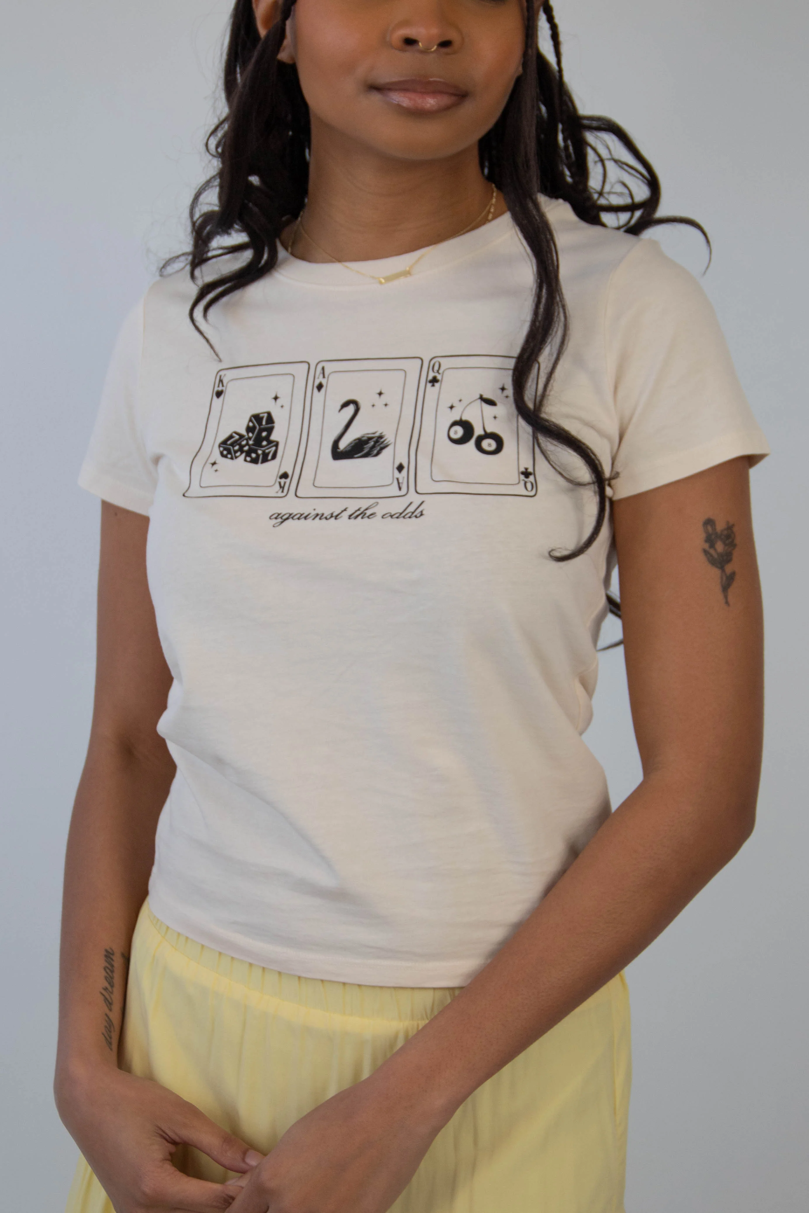 Against The Odds Long Loose Graphic Baby Tee