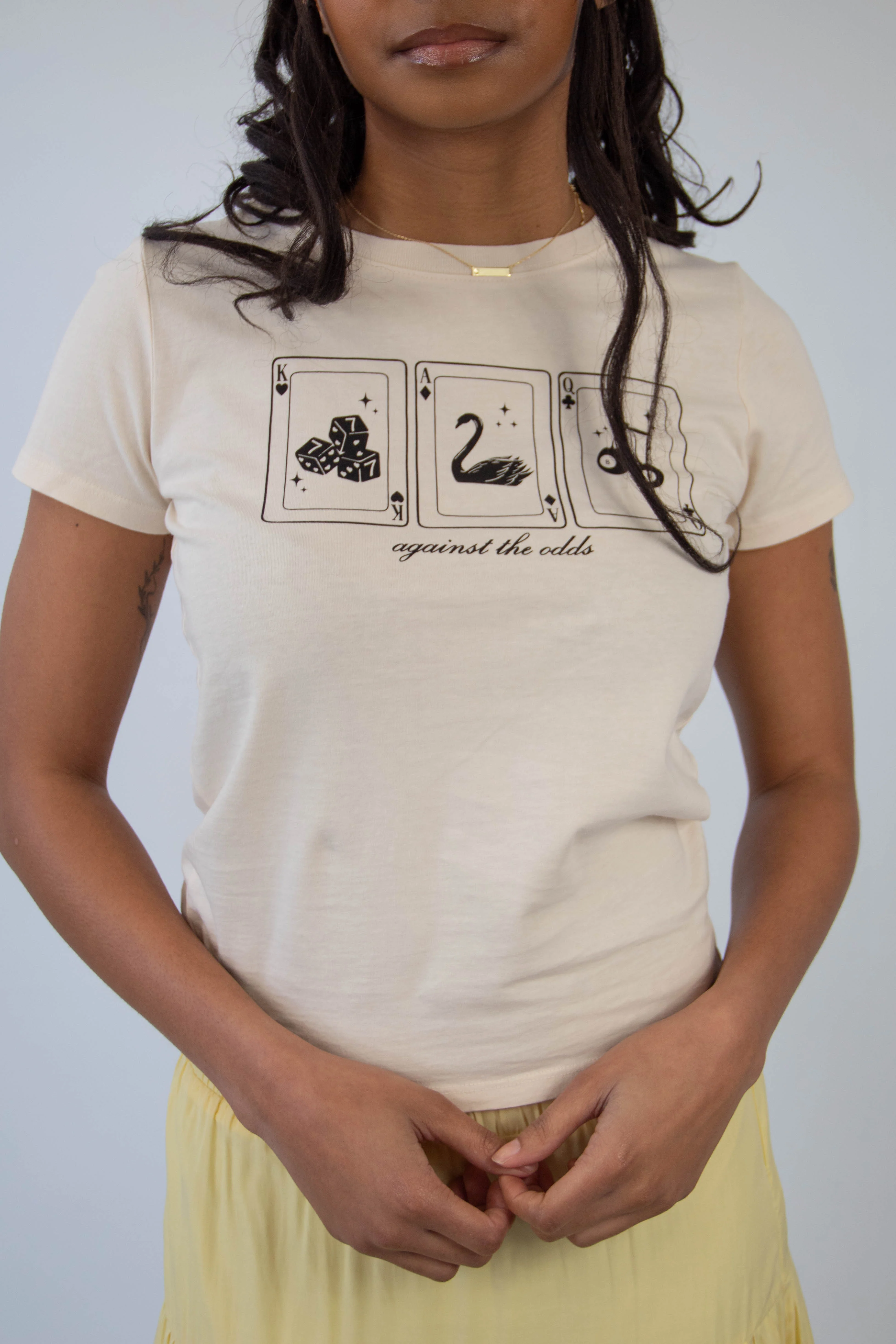 Against The Odds Long Loose Graphic Baby Tee