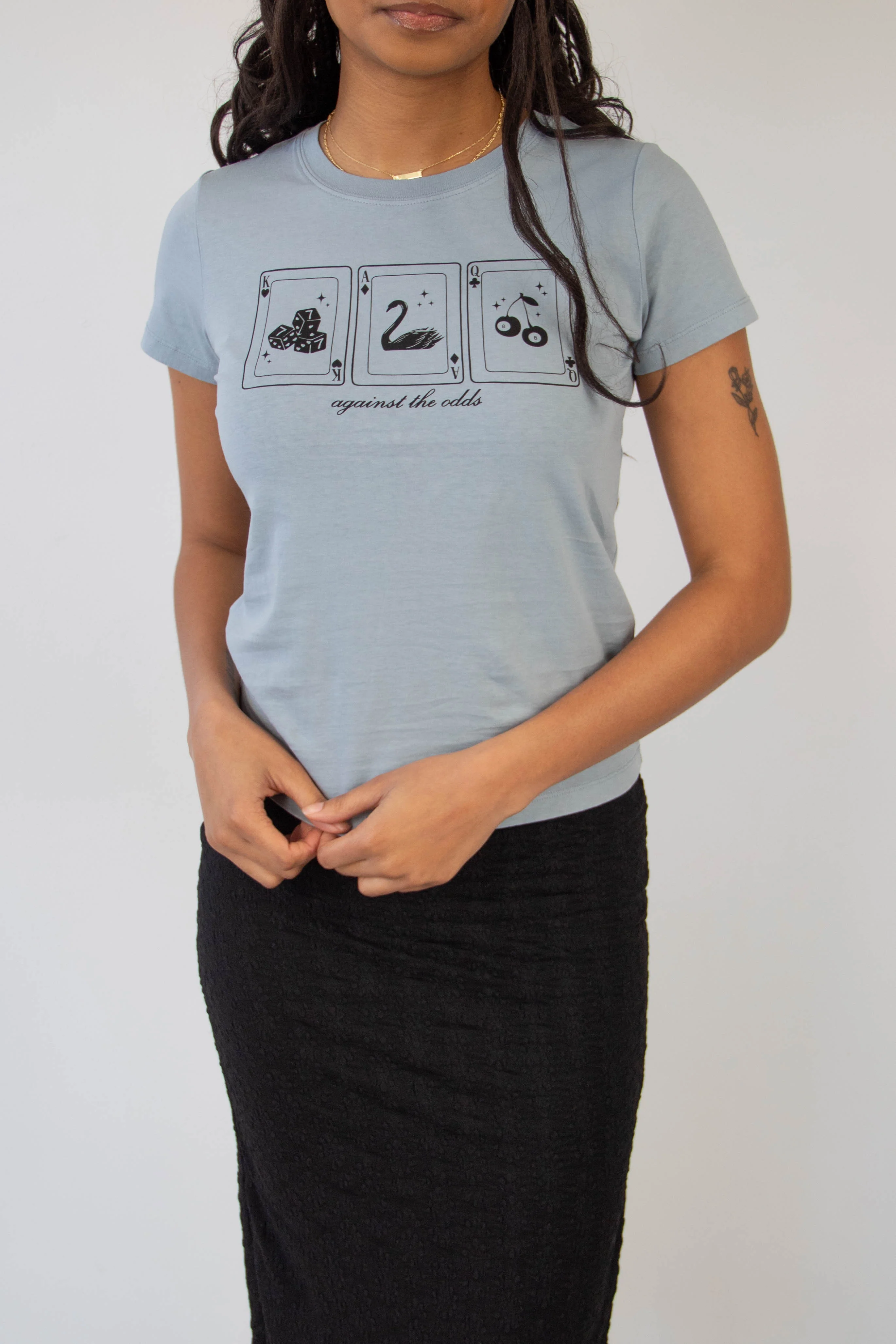 Against The Odds Long Loose Graphic Baby Tee