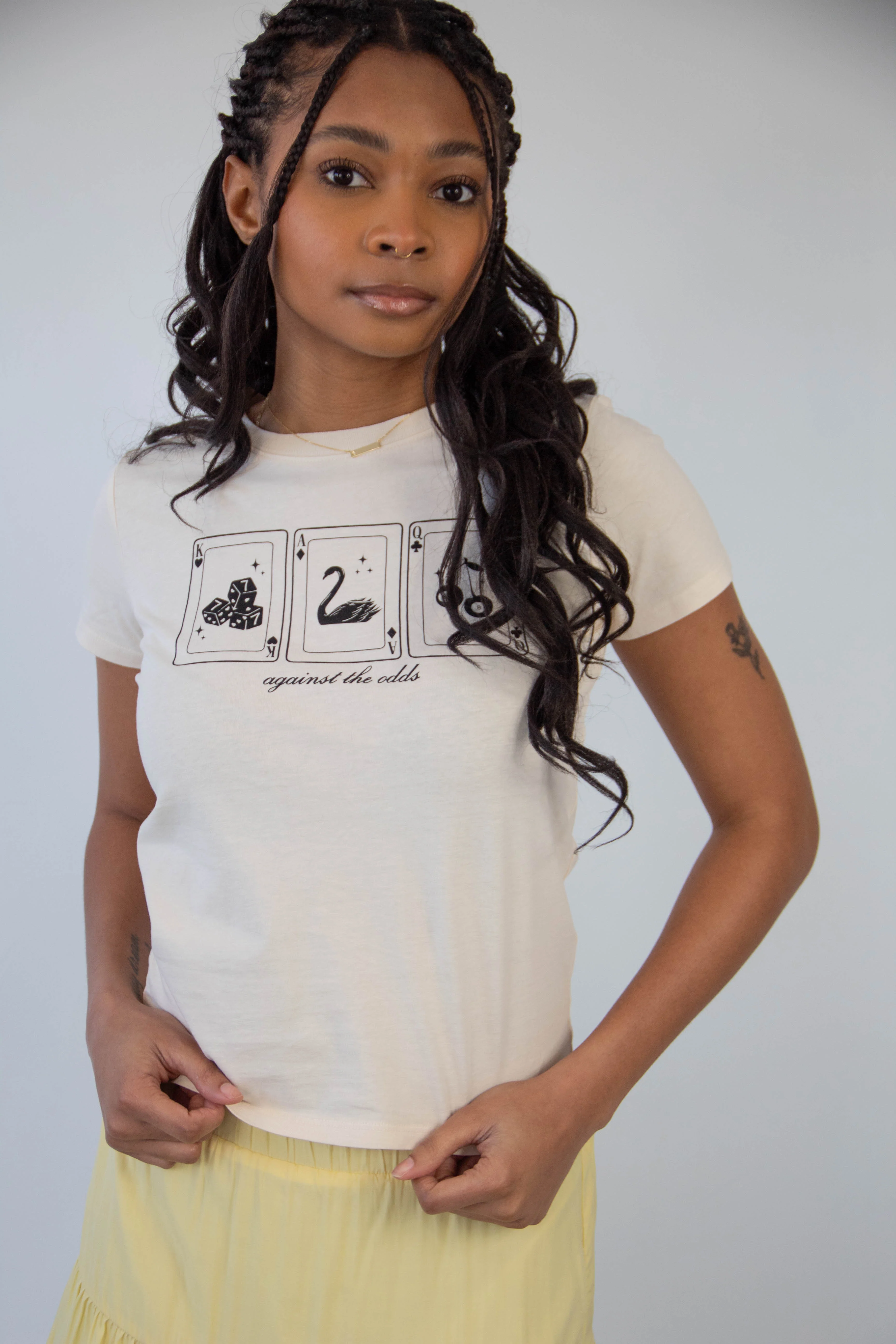 Against The Odds Long Loose Graphic Baby Tee