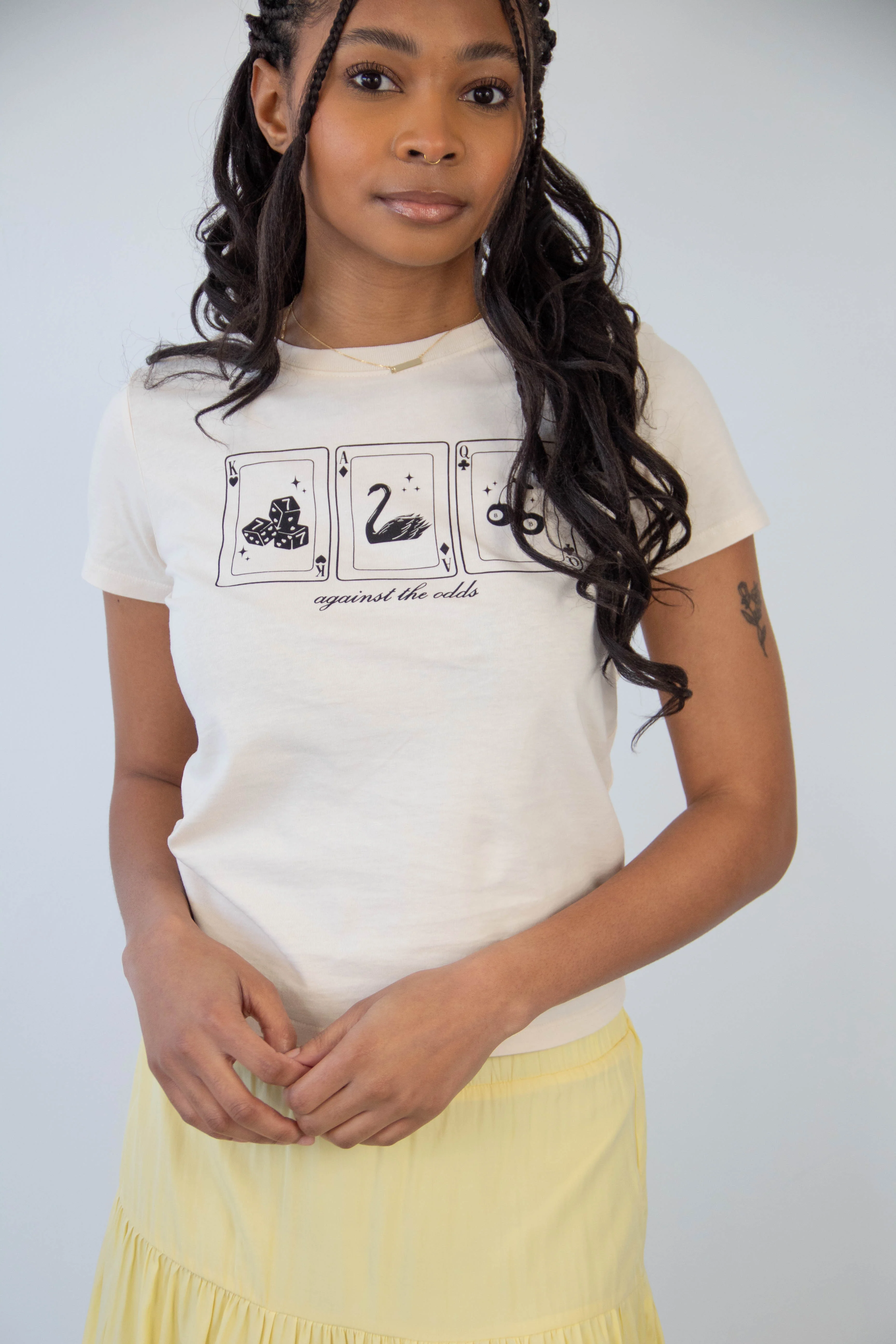 Against The Odds Long Loose Graphic Baby Tee