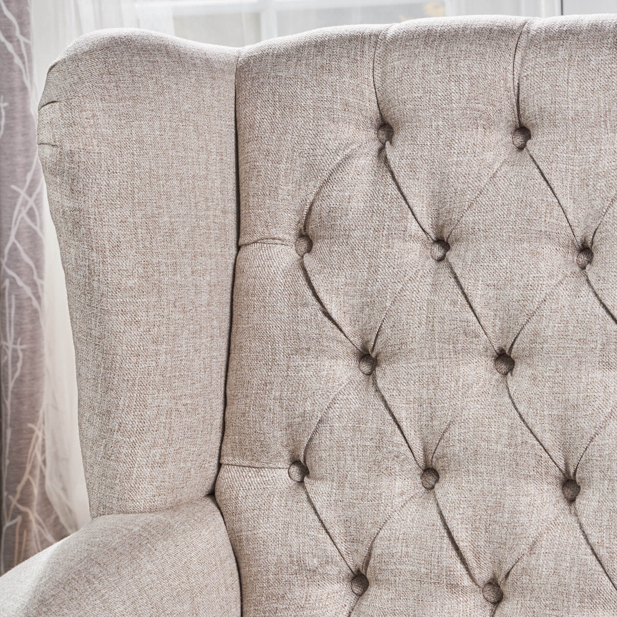 Cerebral Upholstered Wingback Chair with Diamond Tufting and Nailhead Trim