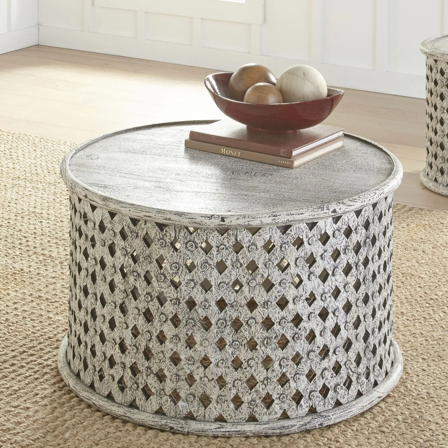 Samir Round Carved Wood Cocktail Table