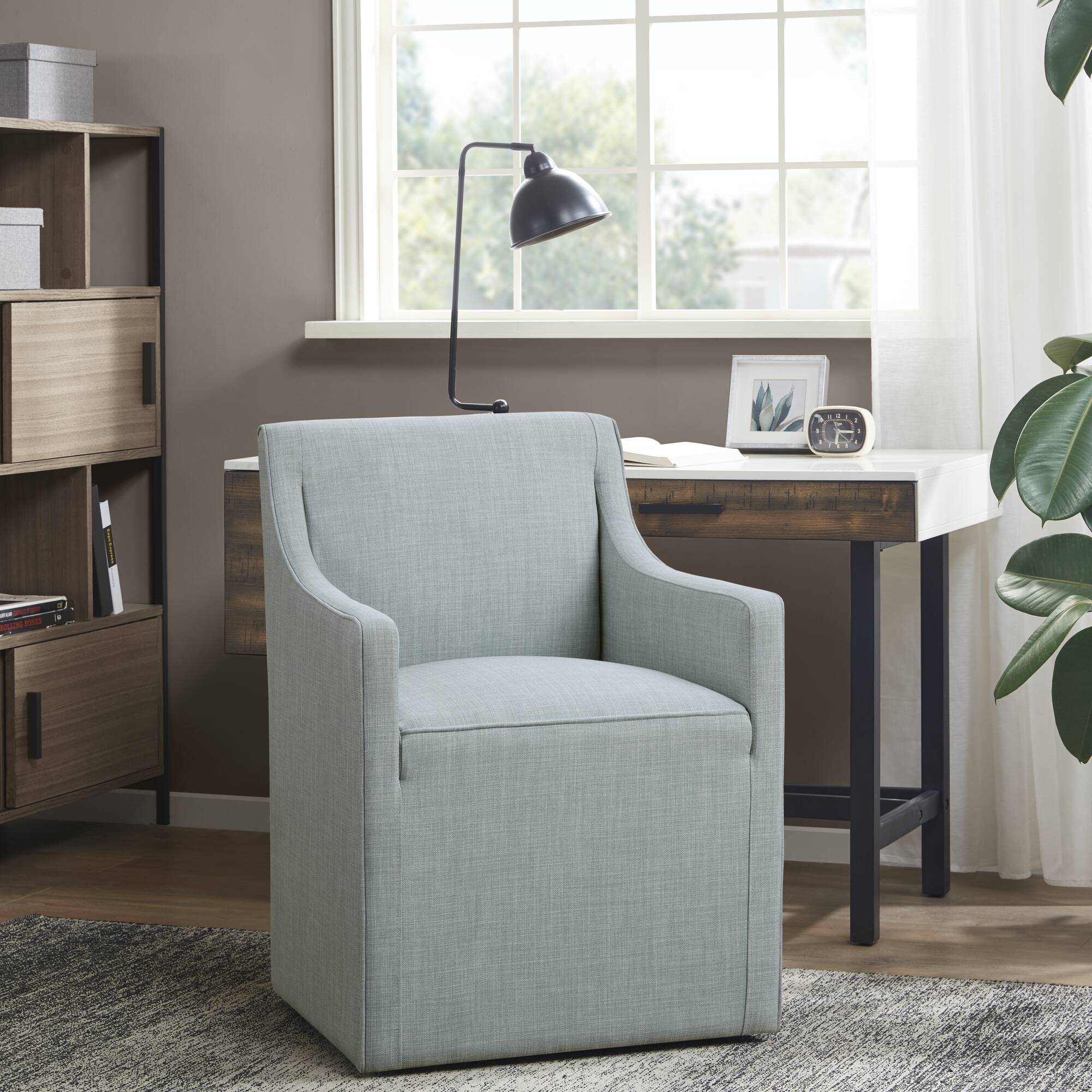 Upholstered Accent Chair with Hidden Casters and Sloped Arms