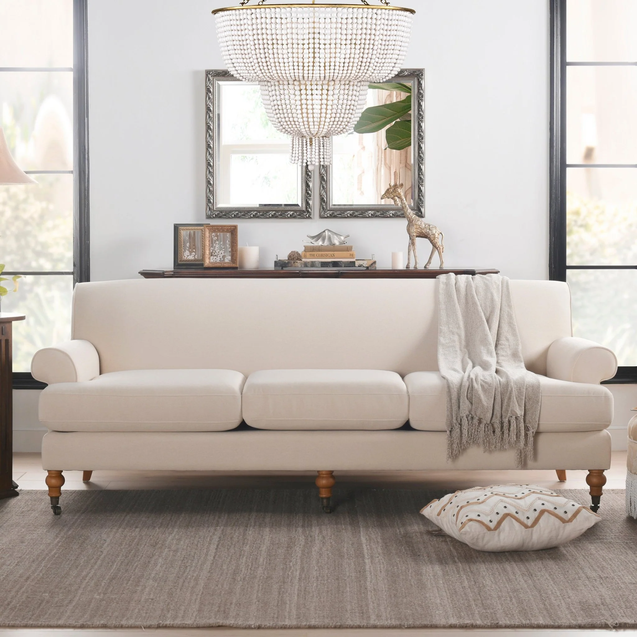 Creations Upholstered Sofa with Metal Casters and 3 Cushions Tightback