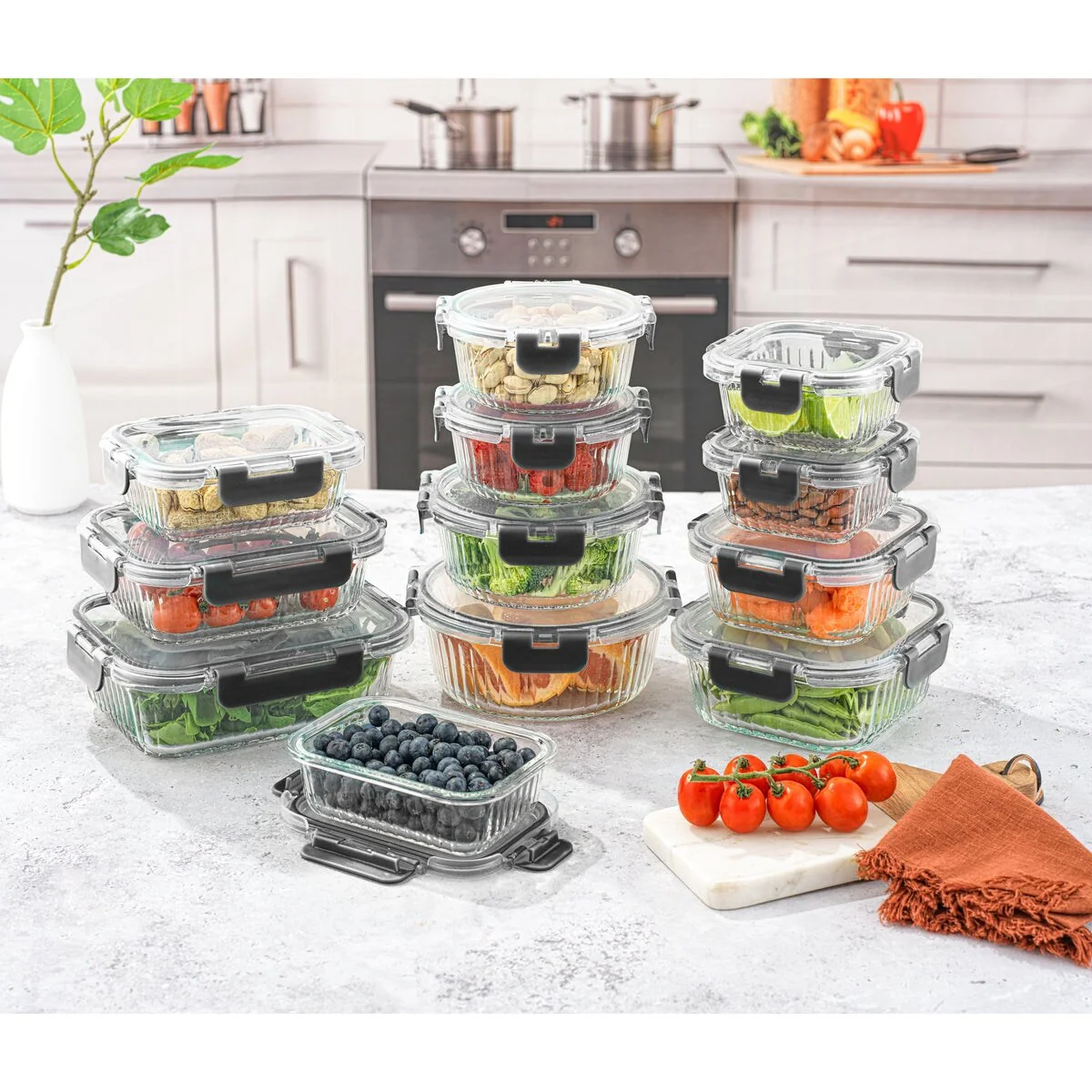 JoyJolt 24-Piece Fluted Glass Food Storage Container Set with Lids - 13.5 oz. 20.5 oz. 32 oz. 5.2 in. 5.9 in. 6.75 in.