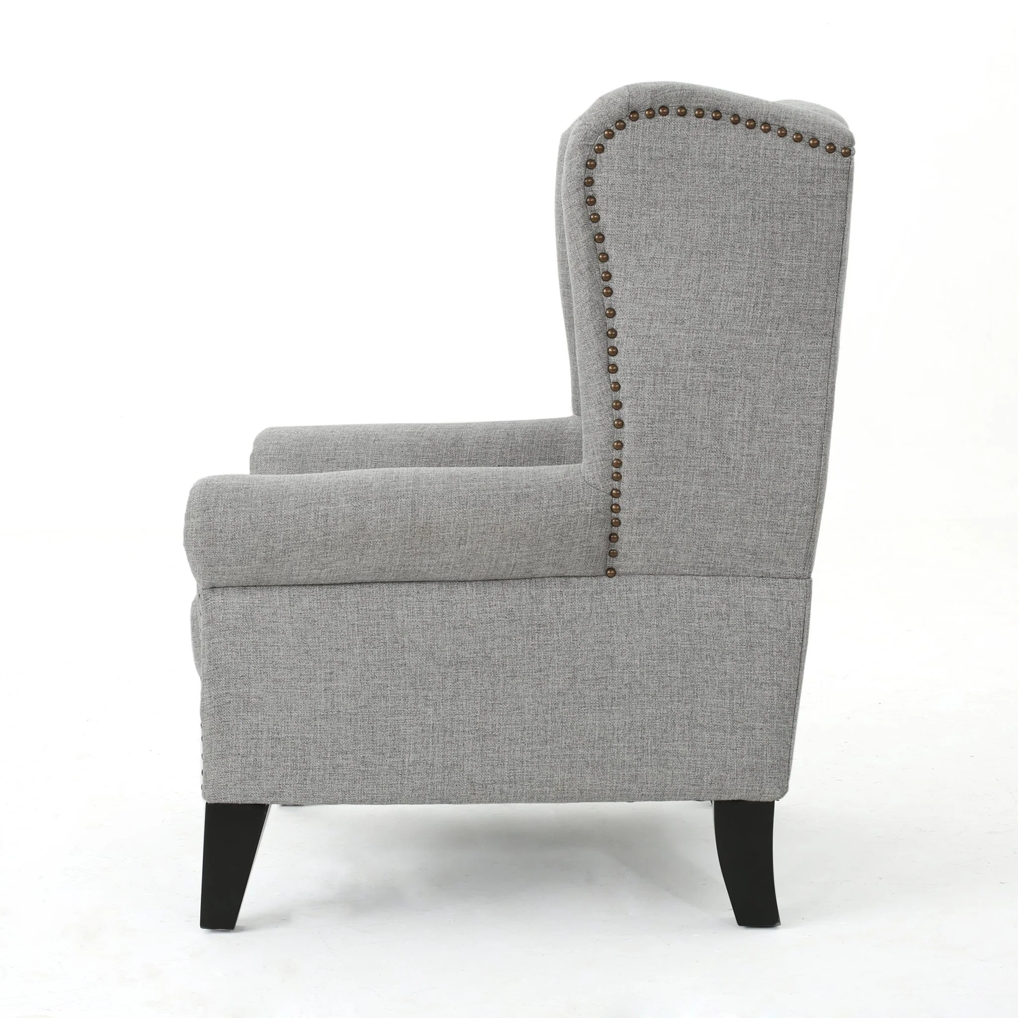 Cerebral Upholstered Wingback Chair with Diamond Tufting and Nailhead Trim