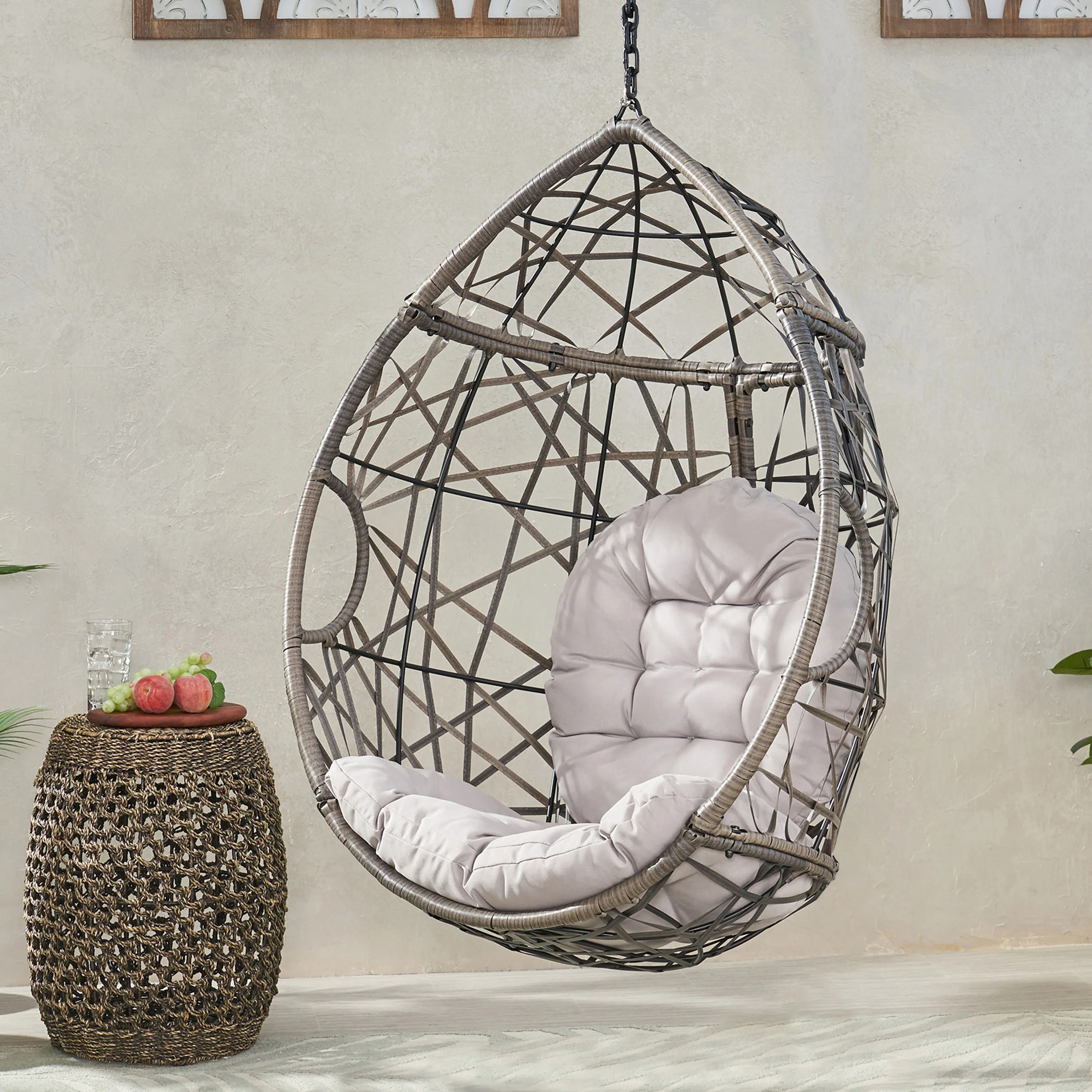 Hanging Chair with Tufted Cushion and Teardrop Shape