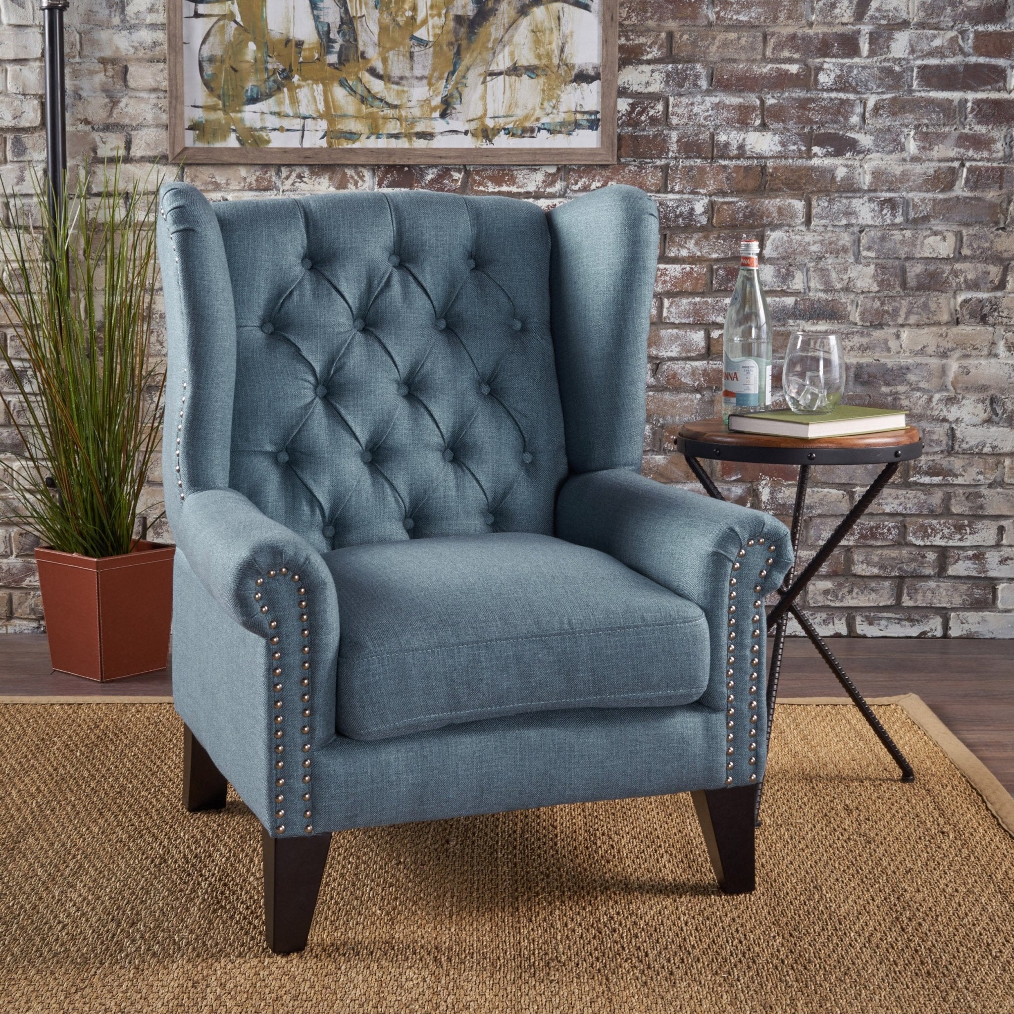 Cerebral Upholstered Wingback Chair with Diamond Tufting and Nailhead Trim