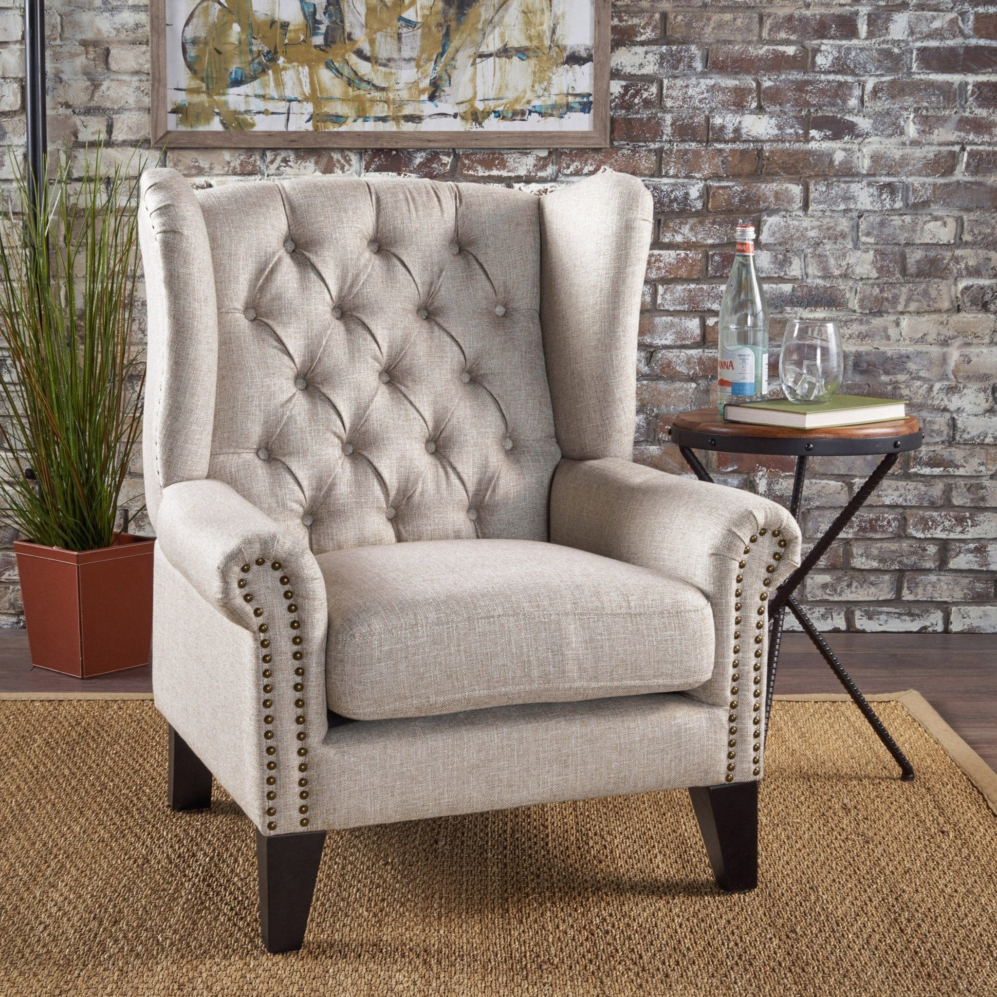 Cerebral Upholstered Wingback Chair with Diamond Tufting and Nailhead Trim