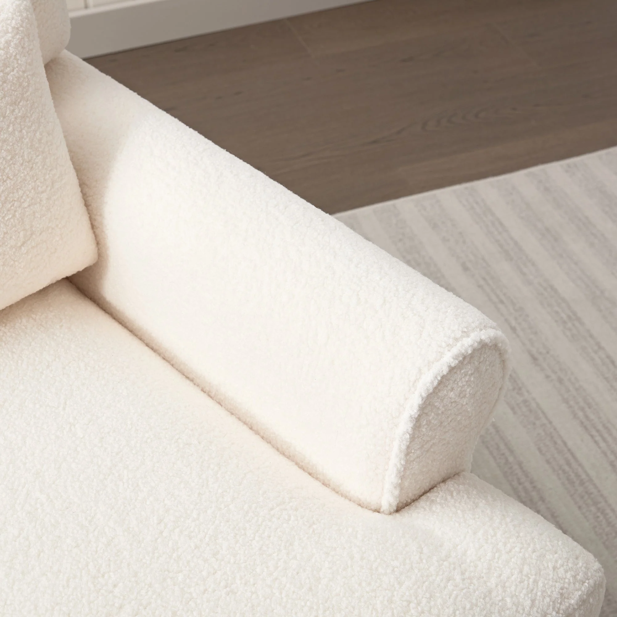 Upholstered Accent Chair with Circular Armrests and Roman Column Legs