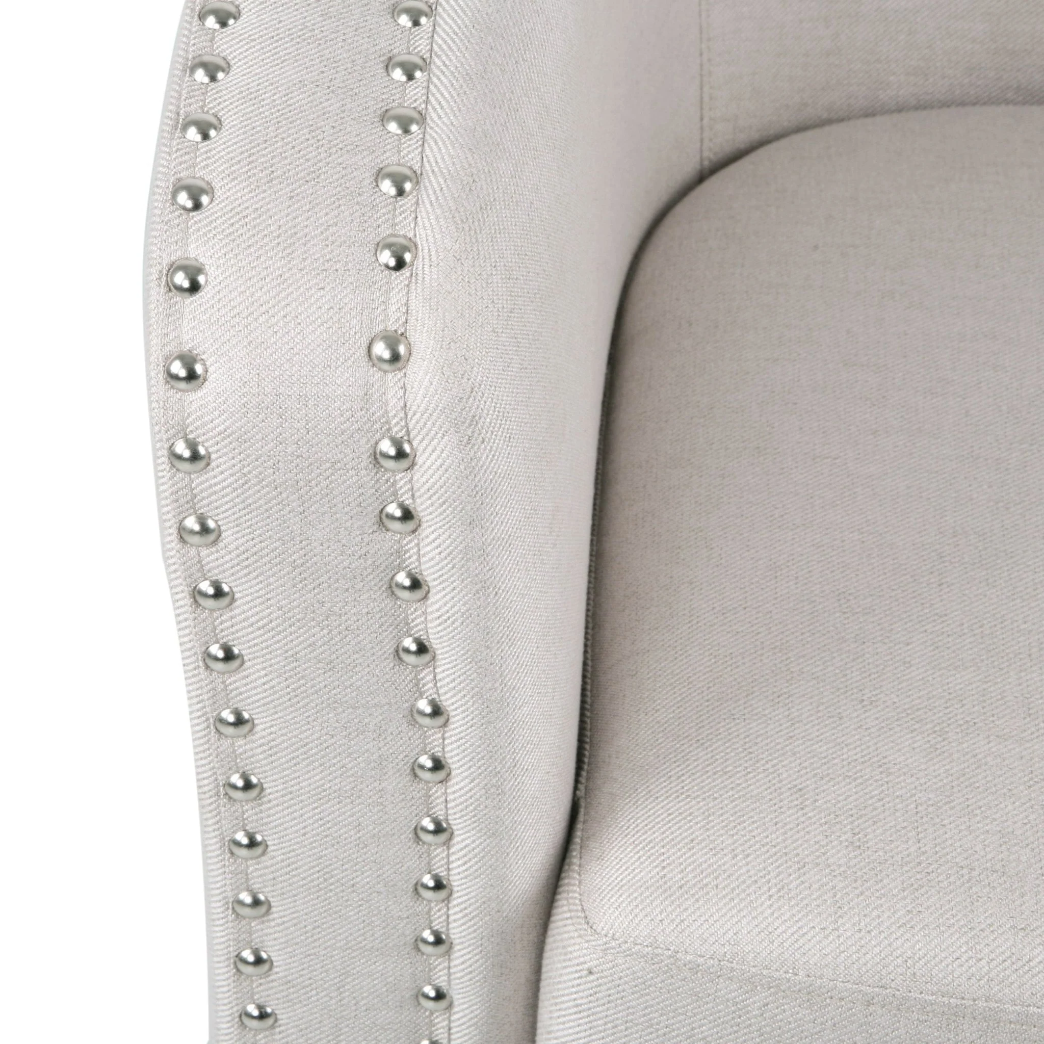 Riverbed Upholstered Swivel Chair with Nailhead Trim and Sloped Arms