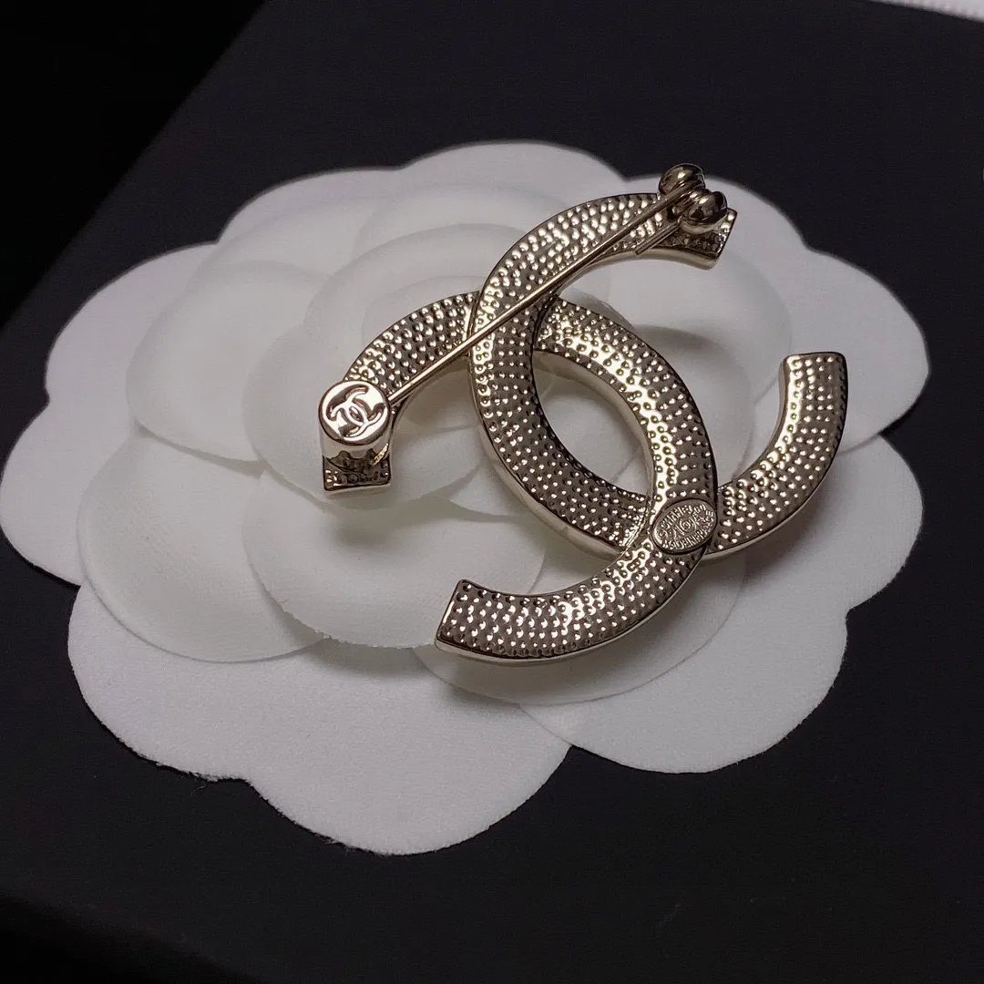 cc Brooch