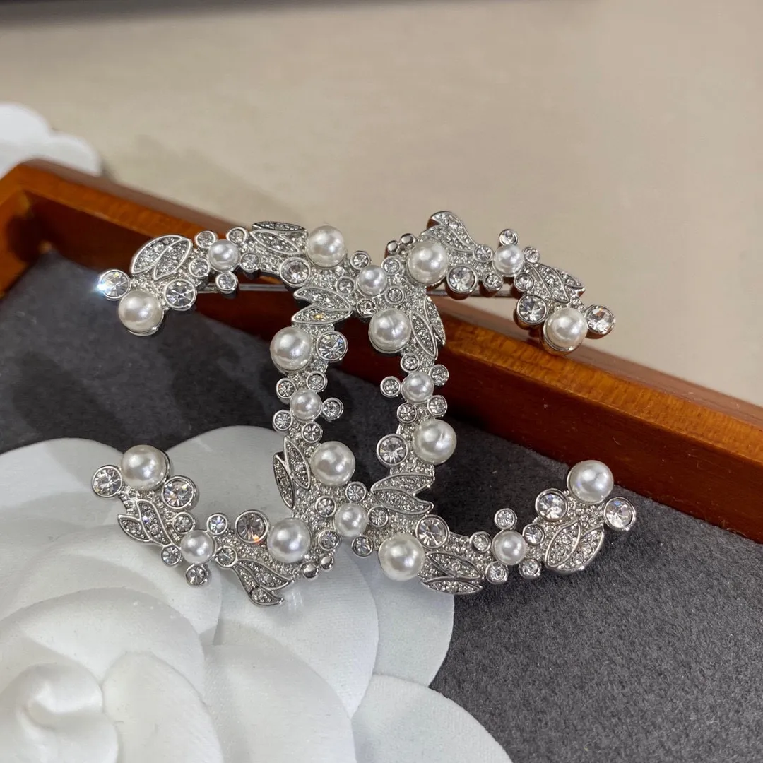 cc Brooch