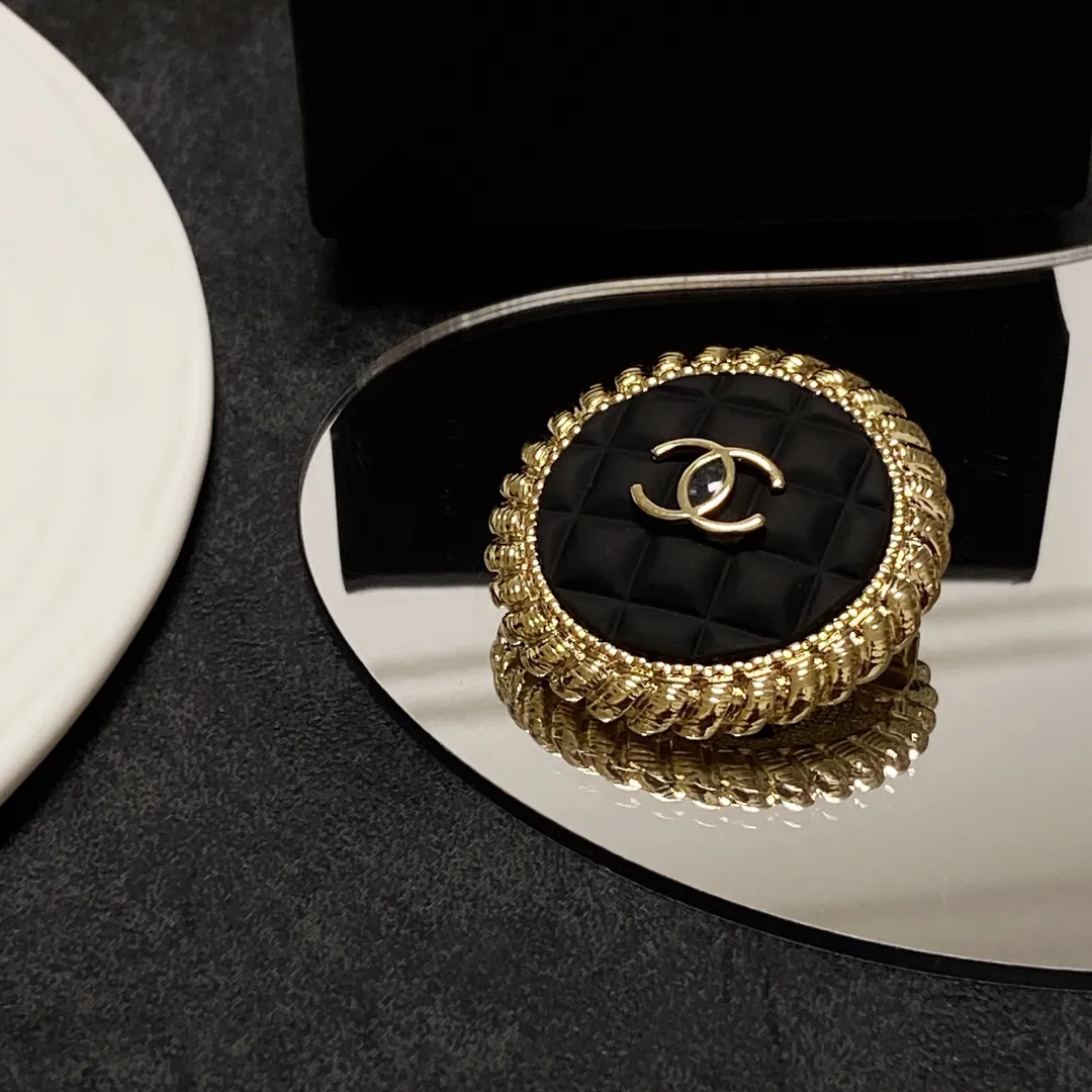 cc Brooch