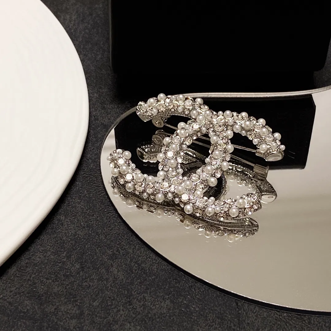 cc Brooch