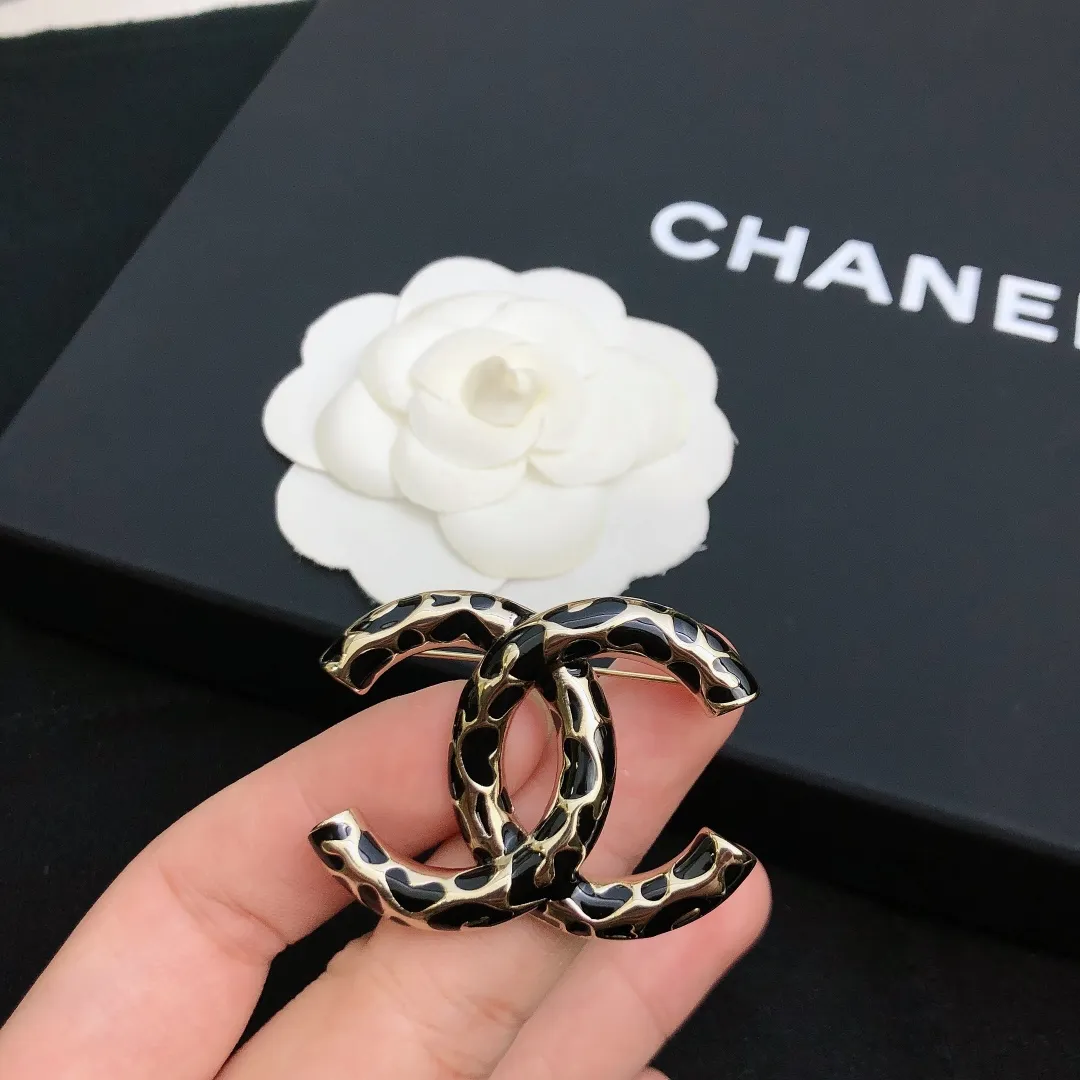 cc Brooch