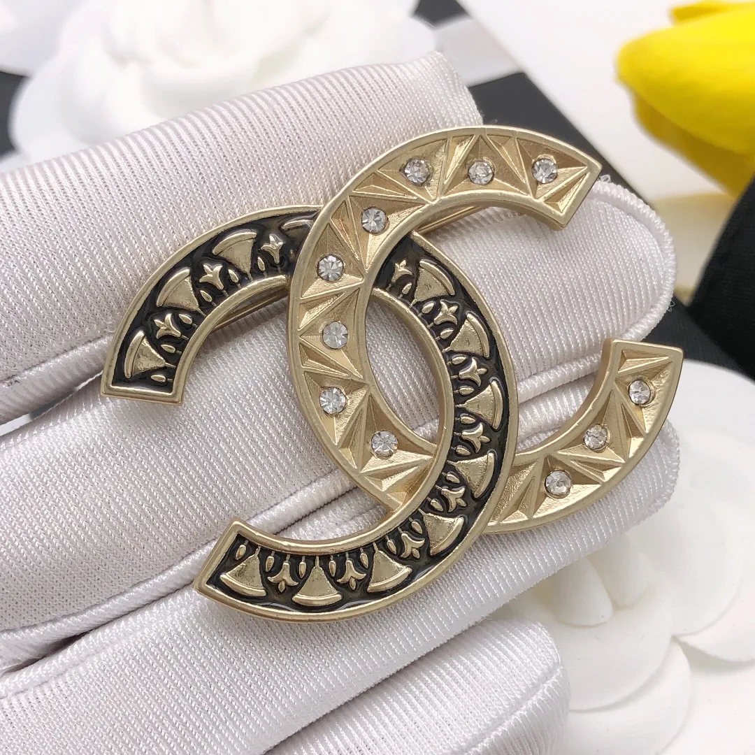 cc Brooch