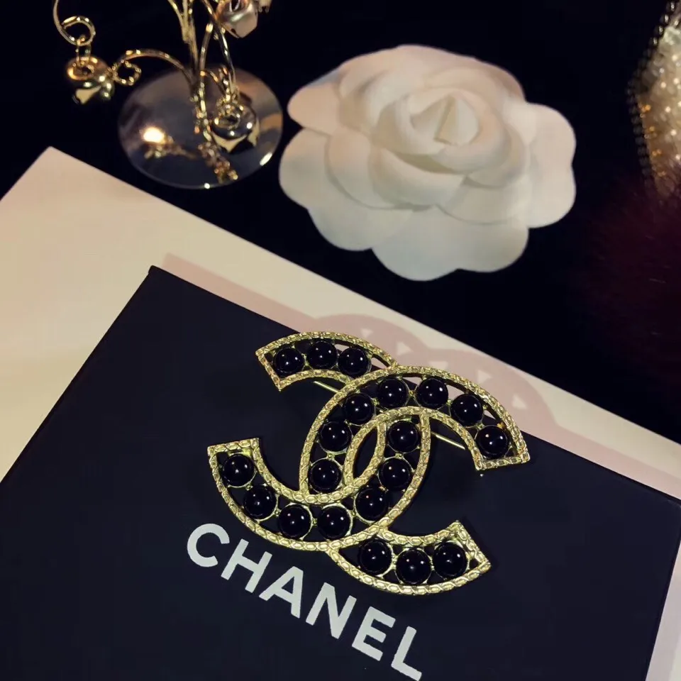 cc Brooch