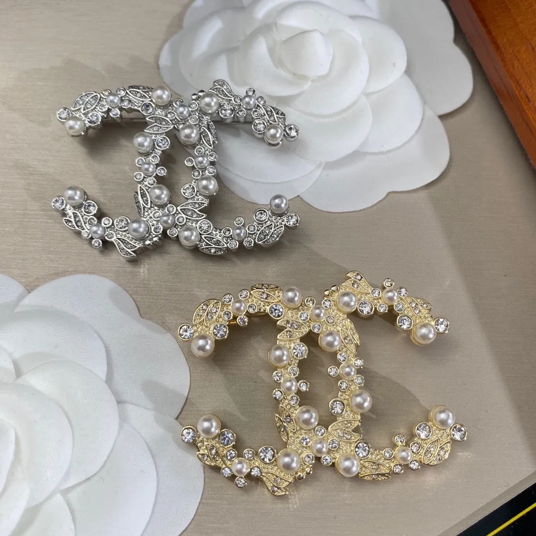 cc Brooch