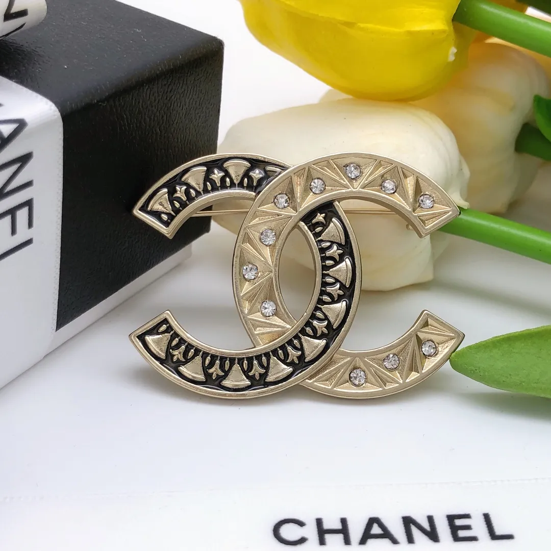 cc Brooch