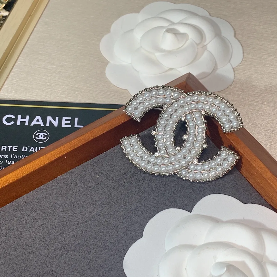 cc Brooch