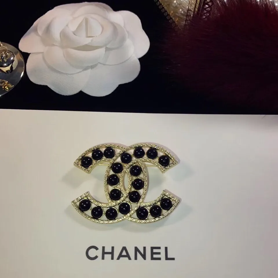 cc Brooch