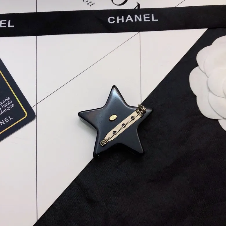 cc Brooch