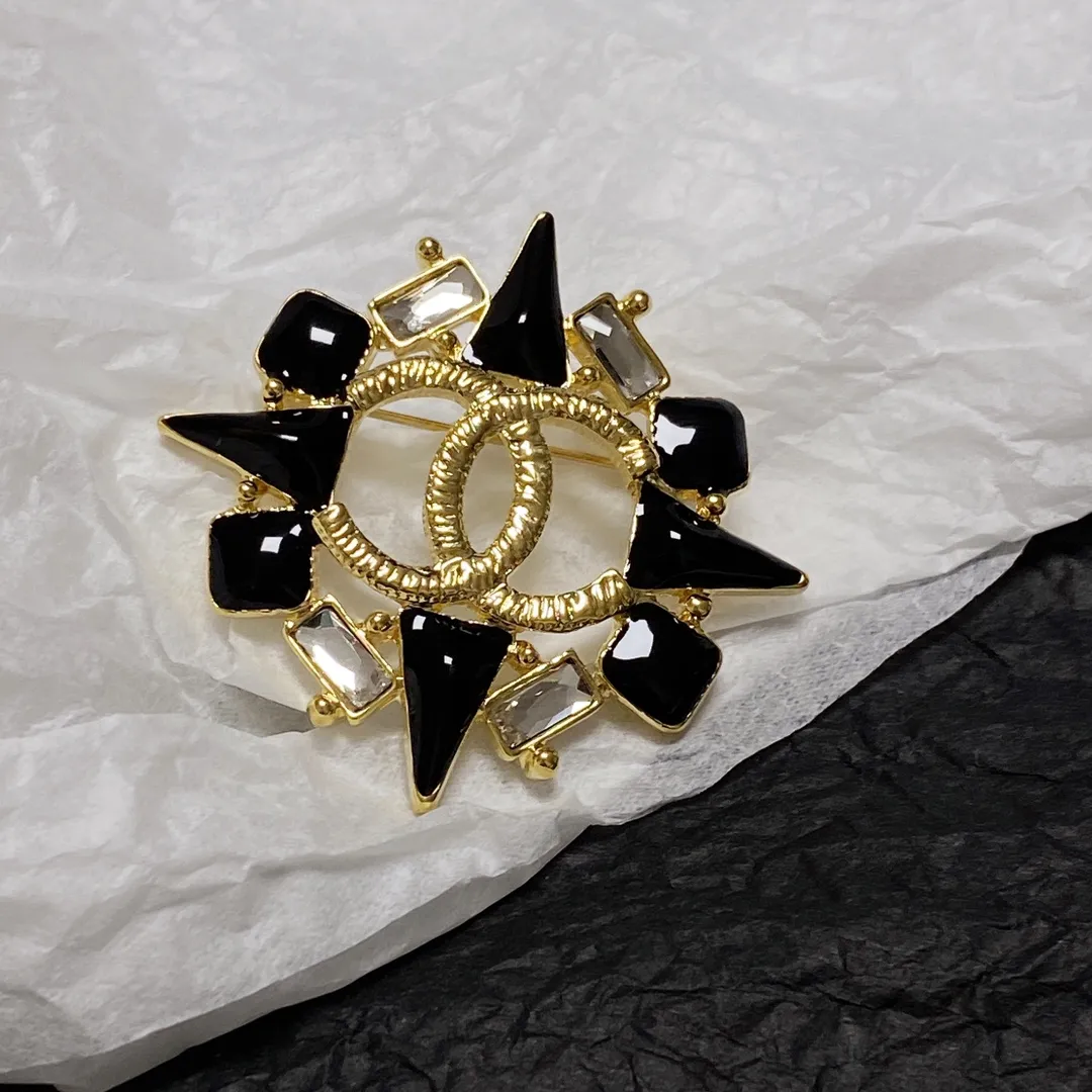 cc Brooch