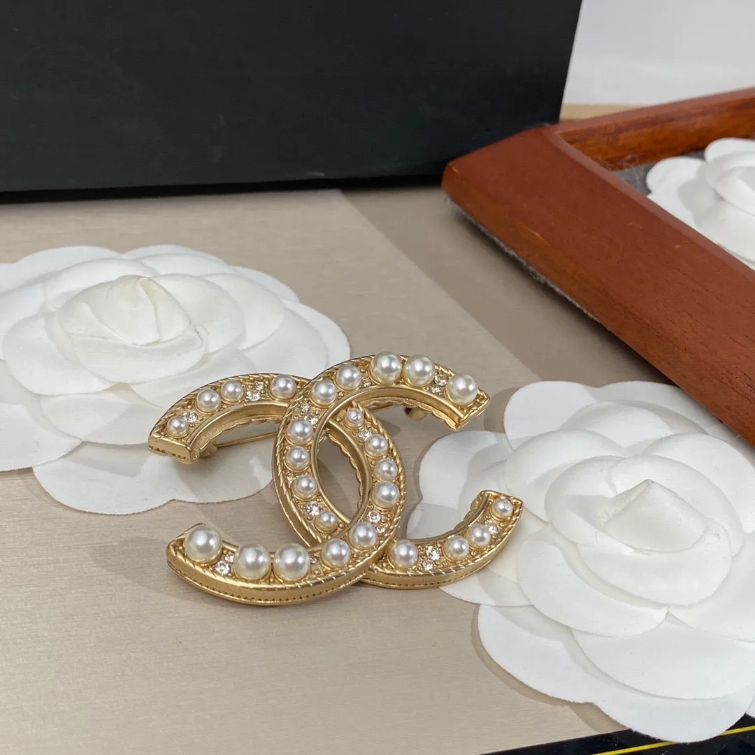 cc Brooch